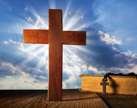 Christian wood cross on blue sky wooden made with Bible and rosary beads
