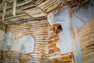Urban decay abstract - damaged interior od an abandoned house at an old gold mine in Colorado