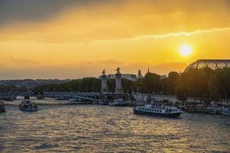 Paris France, city skyline sunset at Seine River with Pont Alexandre III bridge and Grand Palais