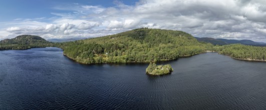 Loch at Eilein Castle, loch with island with castle ruins, drone shot, Rothiemurchus, Cairngorms