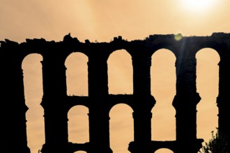 The Acueducto de los Milagros English: Miraculous Aqueduct is the ruins of a Roman aqueduct bridge,