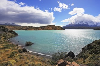Magic turquoise lake Pehoe national park Torres del Paine, Chile. Majestic rocks Los Kuernos on the