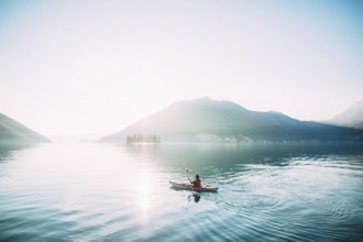 Kayaks in the lake. Tourists kayaking on the Bay of Kotor, near the town of Perast in Montenegro.