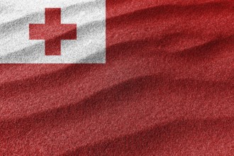 Tonga sand flag, national flag sand background