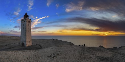 The Rubjerg Knude Fyr lighthouse near Lokken in Denmark in the light of sunset