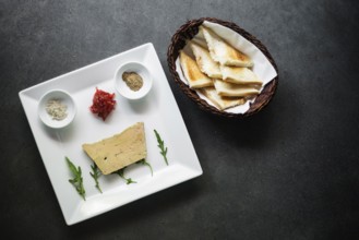 Traditional french foie gras duck pate and toast starter snack platter