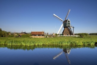 Windmill the Wingerdse Molen close to the Dutch village Bleskensgraaf seen on a clear and crisp day