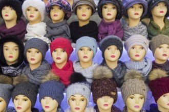Moscow, Russia, Decembet 15, 2019: Mannequin heads in knitted hats and scarves, Europe