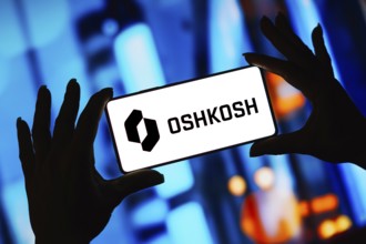 In this photo illustration, the Oshkosh Corporation logo is displayed on a smartphone screen