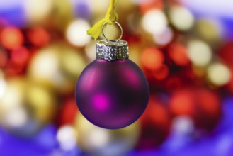 Closeup of an hanging purple christmas ornament