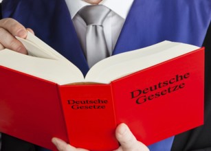 A judge with a German code in court. Austria