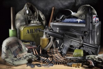 Still life with weapon, army clothing and different equipment