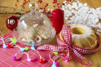 Christmas turban and cupcakes as delicatessen with colorful lights