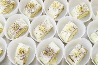A lot of Swiss rolls on buffet table, catering