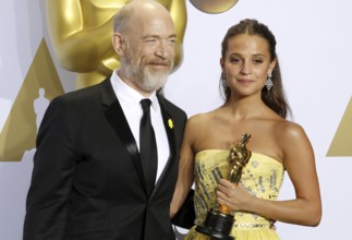 Alicia Vikander and J.K. Simmons at the 88th Annual Academy Awards, Press Room held at the Loews