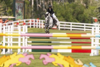 Carly Campbell-Cooper of Canada and riding Baretino, compete in the 1.60m Grand Prix during The