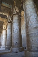 Interior of the painted and carved hypostyle hall at Dendera Temple. Ancient Egyptian temple near
