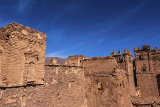 An old kasbah that served as a base for nomadic tribes, with a sense of ruggedness and adventure