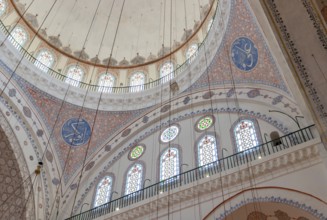 A picture of the colorful and gorgeous interior of the Beyazit Mosque, in Istanbul