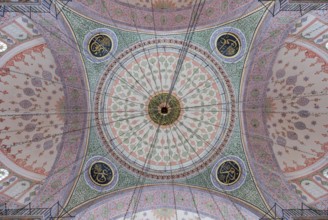 A picture of the colorful and gorgeous interior of the New Mosque, in Istanbul