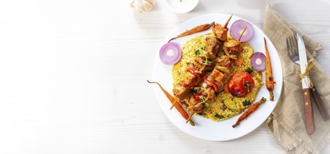 Kebabs with vegetables and bulgur