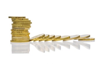 Stacks of coins and lying coins, symbolic photo for mountain of debt, profit collapse and