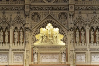 Interior view of the majestic Trinity Church, Detailed reliefs and sculptures on a church wall,