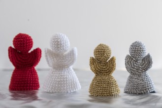 Crocheted angels for the Christmas season, handmade angel figurines, text free space