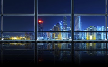 Modern empty and clean office interior with glass windows, Kuala Lumpur city skyline background,
