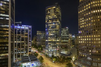 Cityscape at night with illuminated skyscrapers and modern style streets, Vancouver, British