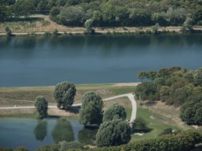 River with bank and trees, next to it a path along the shoreline, Vienna, Austria, Europe