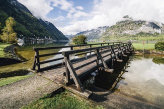 Wooden bridge on Hallstatt Lake a cloudy day