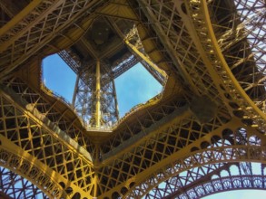 The Eiffel Tower and blue sky (Paris, France). Shooting Location: France, Paris