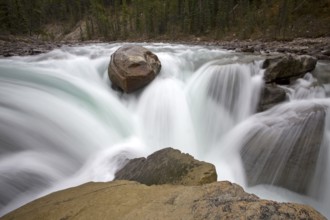 Sunwapta Waterfall Alberta Canada blurred water fall