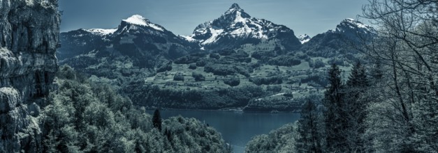 Great panorama over the lake Walensee and its beautiful surroundings, the snowy mountain peaks and