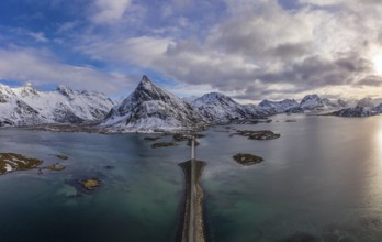 Fredvang Bridge, Car and Volandstind Mountain in Winter. Flakstadoya, Lofoten Islands, Landscape of