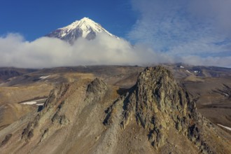 Verblyud (Camel) extrusion rock and the Koryaksky volcano on Kamchatka peninsula, Russia, Europe
