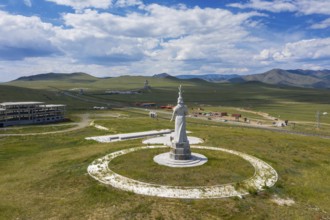 Statue of mongolian Mother and huge equestrian statue of Genghis Khan in the steppe, Mongolia,