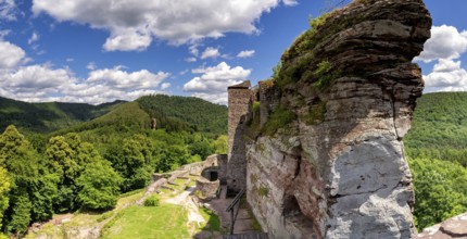 Huge rock with a ruined castle near the French village Lembach in the Vosges mountains