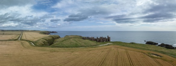 Slains Castle, castle ruins on the cliffs, drone shot, Cruden Bay, Peterhead, Aberdeenshire,