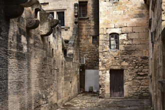 Le Village, an alley, old houses