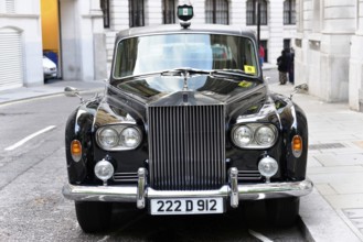 London, London Region, England, United Kingdom, Europe, Black luxury car with shiny finish in a