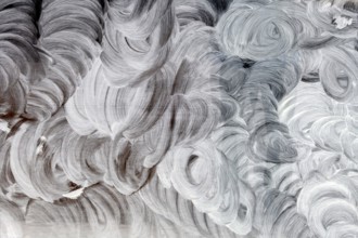 Glass smeared with white paint, symbol for background, texture, chaos Austria