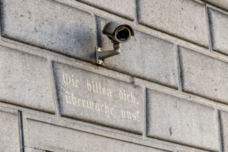 Surveillance camera on a building, symbol for surveillance, internal security, control, data
