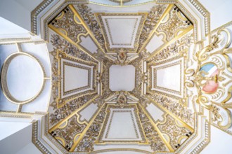 Krakow, Poland, March 23, 2024, Decorated white ceiling with gold plated ornaments, Europe