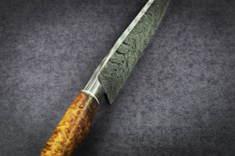 Beautiful luxurious utility knife in Texas Wind damask pattern with noble wood handle on dark