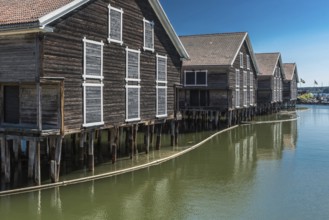 Hudiksvall, Halsingland, Gavleborg County -Sweden, 08 01 2019 Reflecting fishing warehouses in the