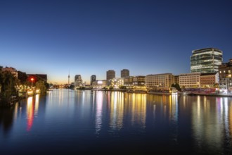 The Spree in Berlin at night with the famous television tower in the background
