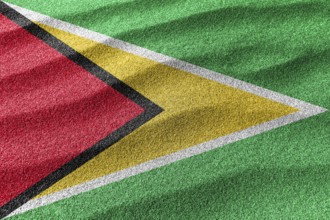 Guyana sand flag, national flag sand background