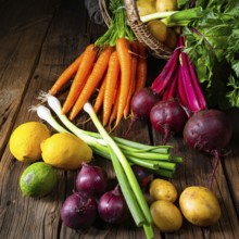 Basket with various vegetables: beetroot and carrots